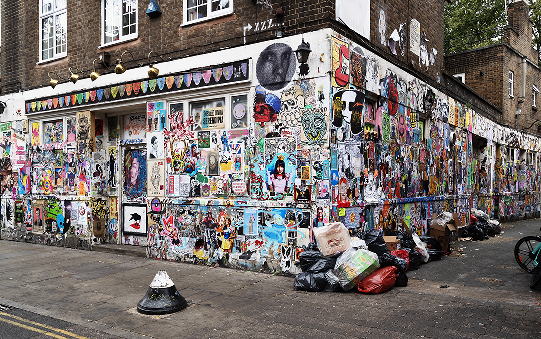 Former Seven Stars Pub Brick Lane covered in Pasteup art for the 2023 London International Pasteup Festival