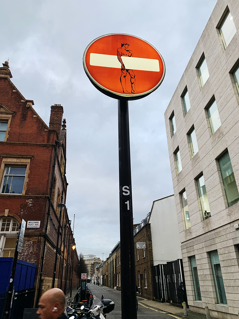 NO entry traffic sign defaced by Clet Abraham street art image of David 